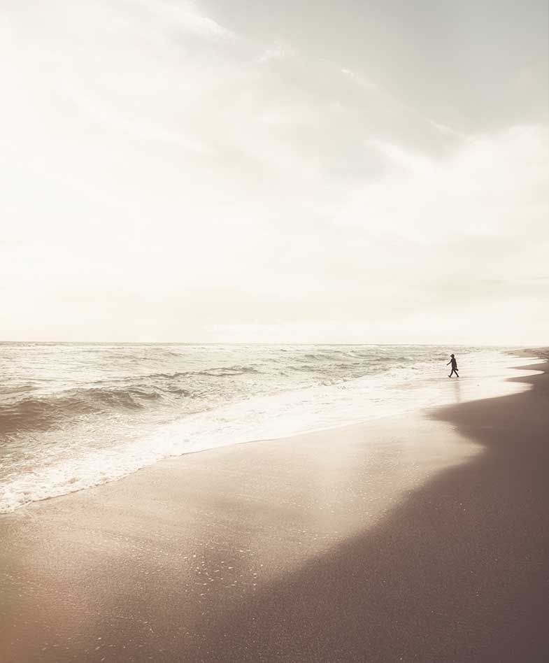 Person Walking on a Beach in Florida