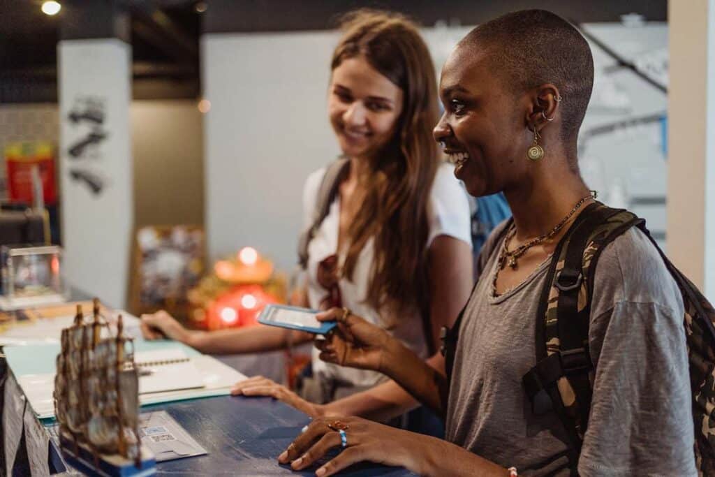 Woman Checking In and Smiling